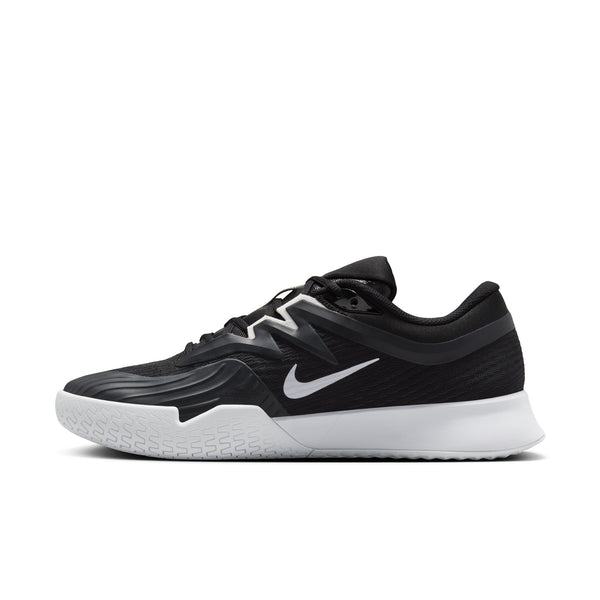 The medial side of a Men's Nike tennis shoe with a small white Swoosh.