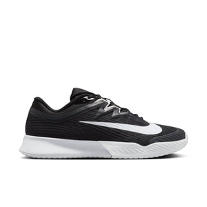 The lateral side of a mostly all black Nike tennis shoe.