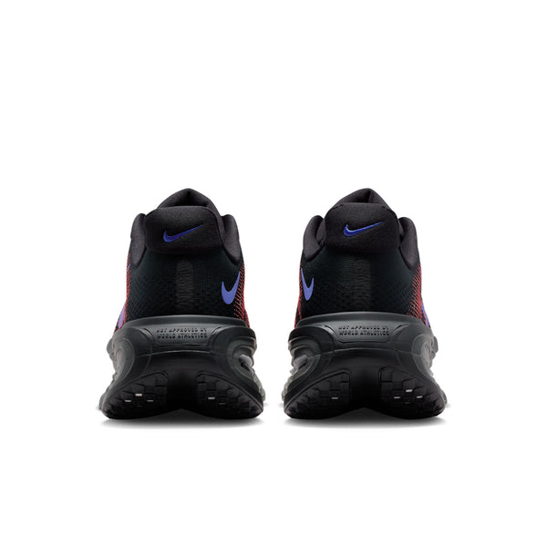 Black athletic shoes with purple accents on a white background
