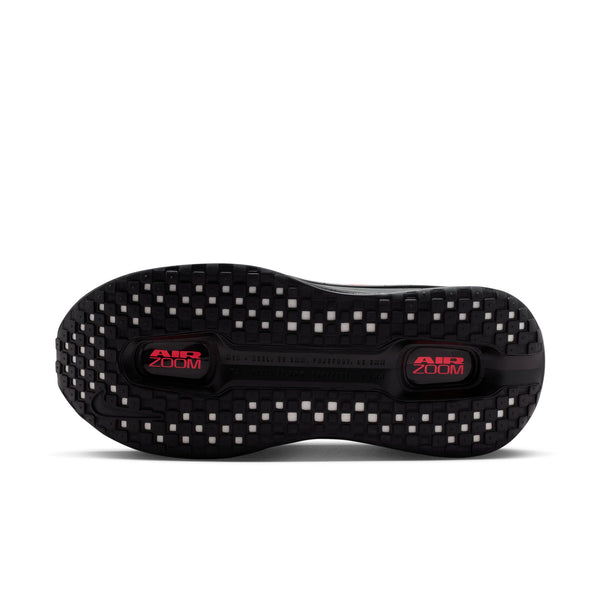 Black running shoe sole with 'Air Zoom' branding on a white background