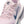 CLose up of the upper of a Vomero Premium witht a pink upper and violet Nike swoosh.