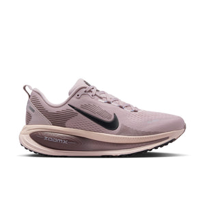 A Women's nike running shoe with a upper that matches the laces and midsole.