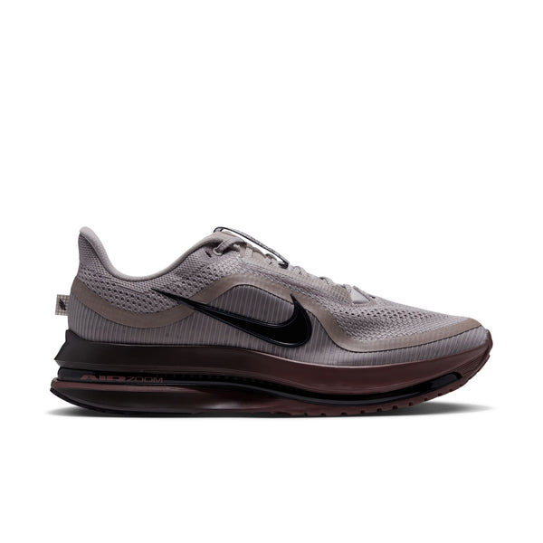 A dark grey Nike running show with a black swoosh right in the middle.