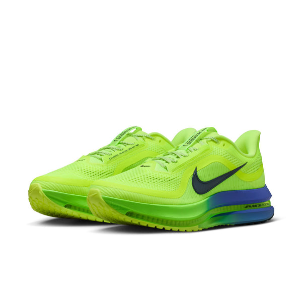 A pair of men's Vnike running shoes with exposed Air Zoom in a Volt colorway.