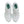 White sneakers with green accents on a white background.
