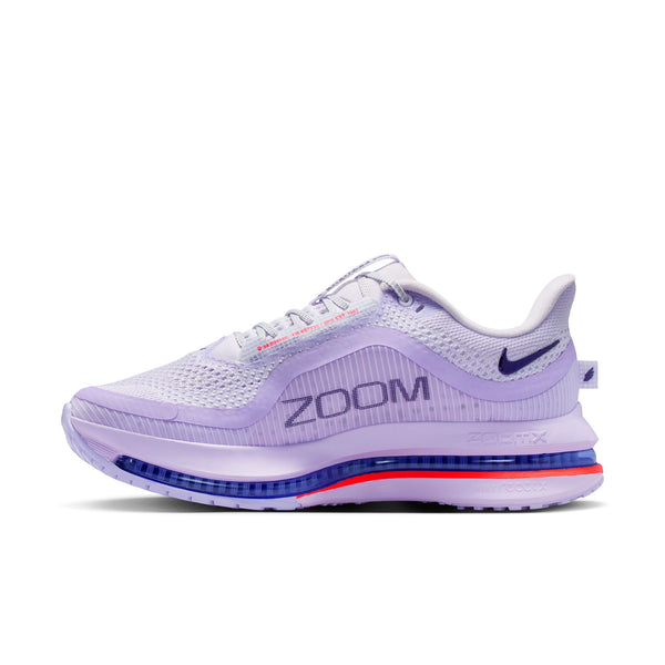 Purple running shoe with 'Zoom' text on a white background