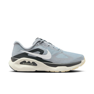 Gray, white and black Nike running shoe with Nike logo on a white background