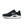 The medial side of a black and white Nike Structure plus with a focus on the midsole that provides extra stability.