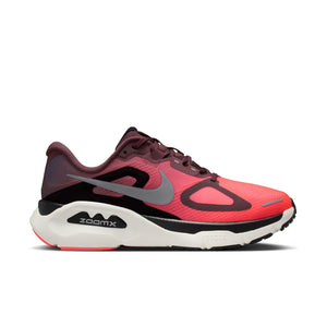 Red and black running shoe with Nike logo on a white background