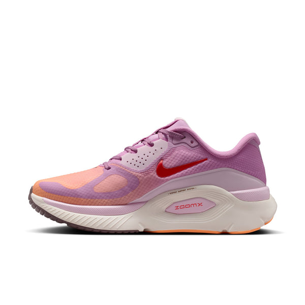 Pink and orange running shoe with Nike logo on a white background