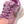 Pink and purple Nike running shoe with a visible brand logo on a white background