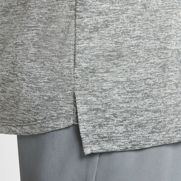 Close-up of gray athletic shorts with a textured pattern.