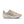 Beige Nike trail running shoe with a white sole on a white background