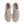 Top down look at a beige sneakers with orange accents on a white background
