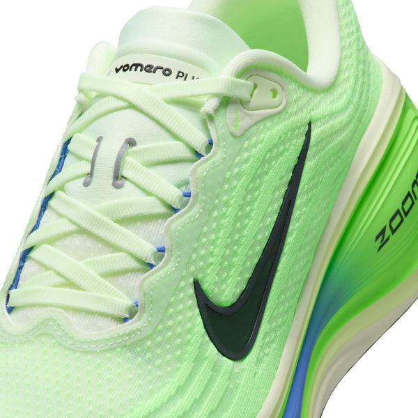 Light green running shoe with black swoosh logo on a white background