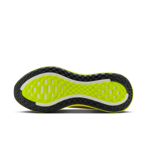 Close-up of a shoe sole with a textured pattern on a white background.