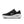 The medial side of a Nike black running shoe with white sole and swoosh in the middle of the shoe.