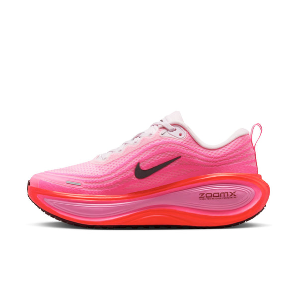 The medial side of a pink running shoe with black swoosh logo on a white background.