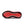 Close-up of a red and black shoe sole on a white background.