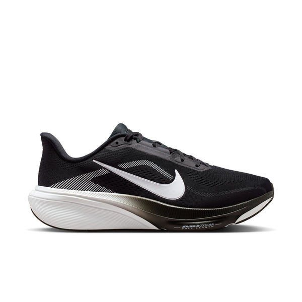Black running shoe with white sole on a white background