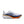White running shoe with orange and black accents on a white background