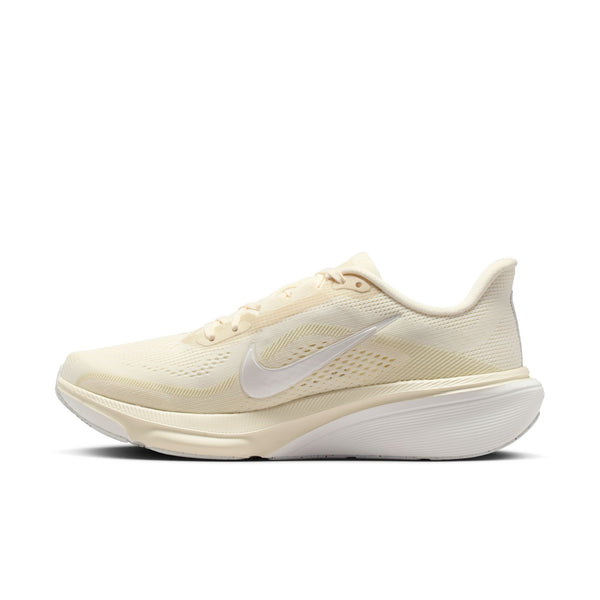 The medial side of a Nike Pegasus 42 running shoe with a white swoosh and a white midsole near the heel.