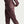 A side angle of a man wearing a Nike Running pant called the Stride Plus.
