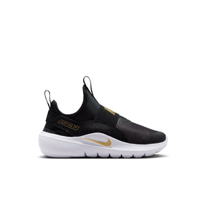 A Nike Air Max slip-on sneaker in black with gold and white accents, shown from a side profile on a white background.
