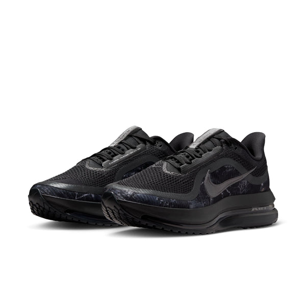 Black Nike sneakers on a white background