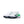 A pair of Nike running shoes in white, featuring a dark navy blue Swoosh and heel, and bright green accents on the side and midsole, set against a plain white background.