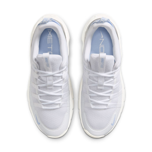 White athletic shoes with blue accents on a white background
