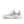 White sneaker with a light gray sole on a white background