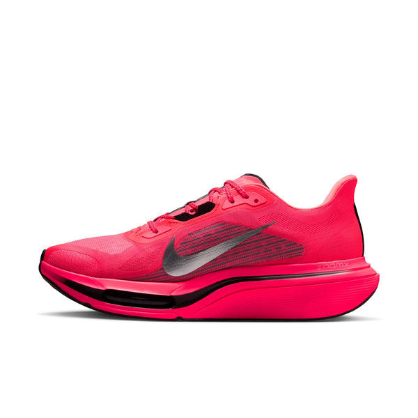 A bright pink Nike running shoe with a black and gray Swoosh logo, shown on a white background.