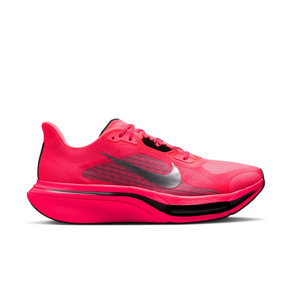 A bright pink Nike running shoe with a black and gray Swoosh logo, shown on a white background.