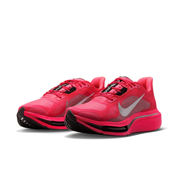 Red running shoe with black swoosh logo on a white background