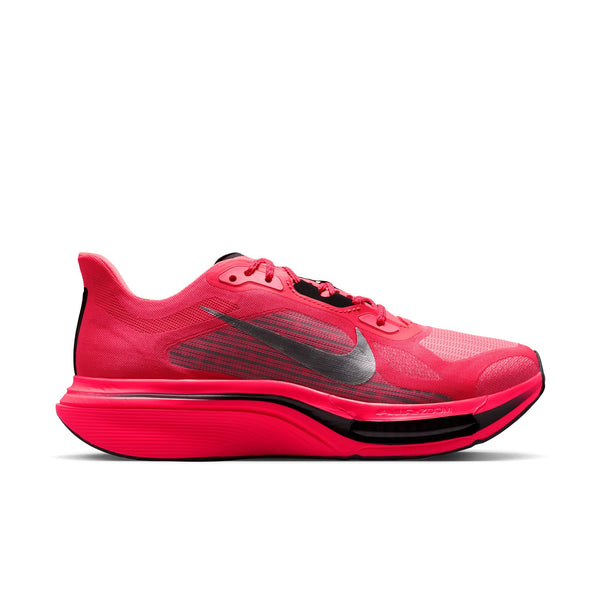 Red running shoe with black swoosh logo on a white background