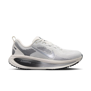White running shoe with 'zoomx' branding on a white background
