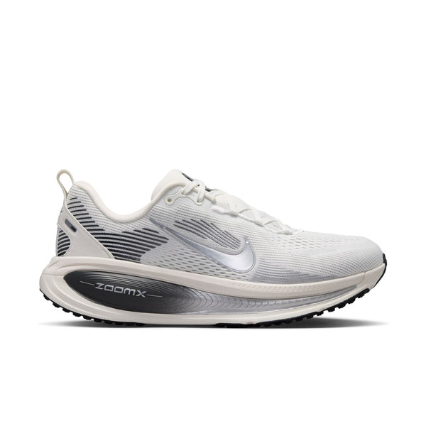 White running shoe with 'zoomx' branding on a white background