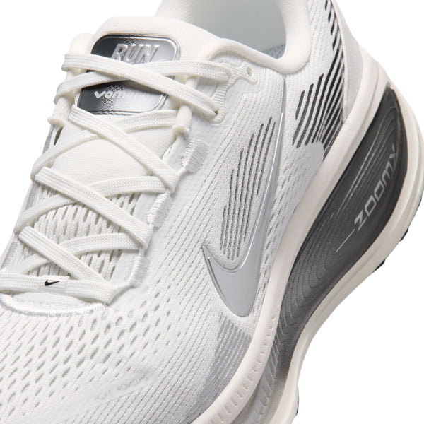 White running shoe with gray accents on a white background