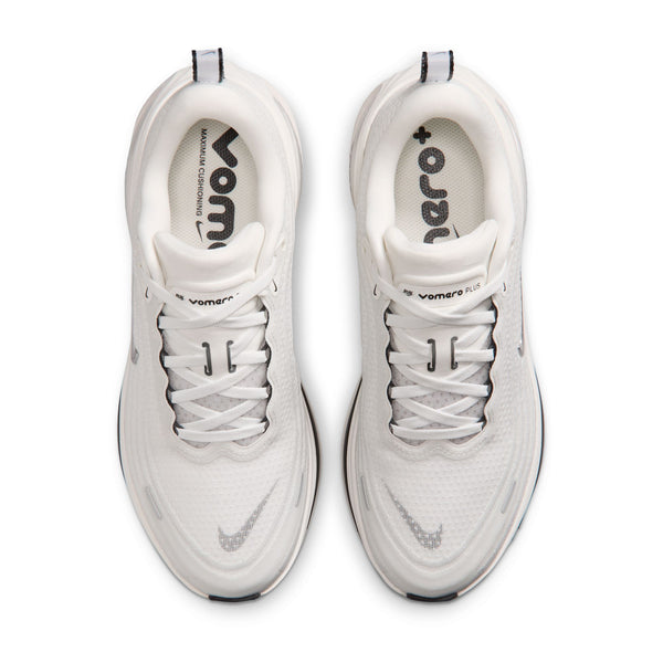 White sneakers with brand logos on a white background