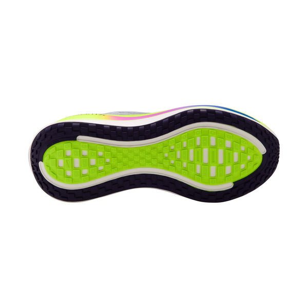 The outsole of a Nike running shoes with a neon green middle surrounded by a dark tread.