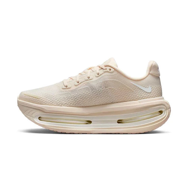 Cream running shoe on a white background