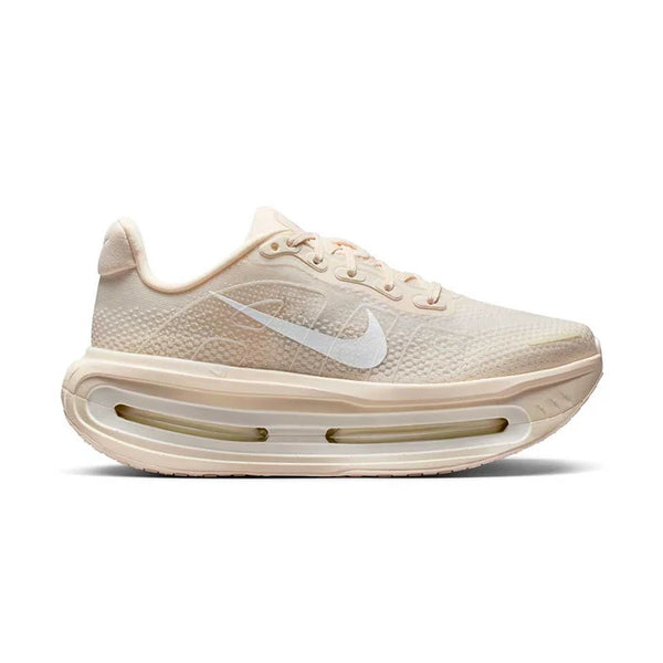 Cream running shoe on a white background