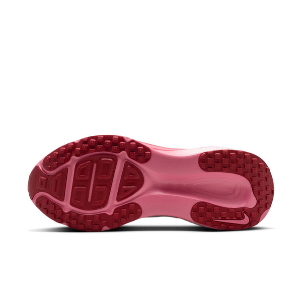 The outsole of this Women's Vomero 18 has pink colored lugs under the forefoot and around the heel for more traction.