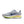 Gray running shoe with a blue swoosh logo on a white background