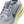 Gray running shoe with Nike logo and brand name on a white background