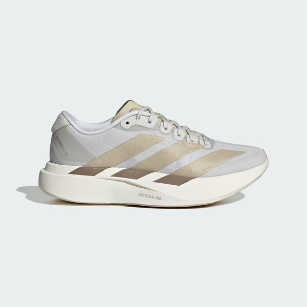 An Adidas running shoe in light gray, beige, and white, shown from a side profile on a light gray background.