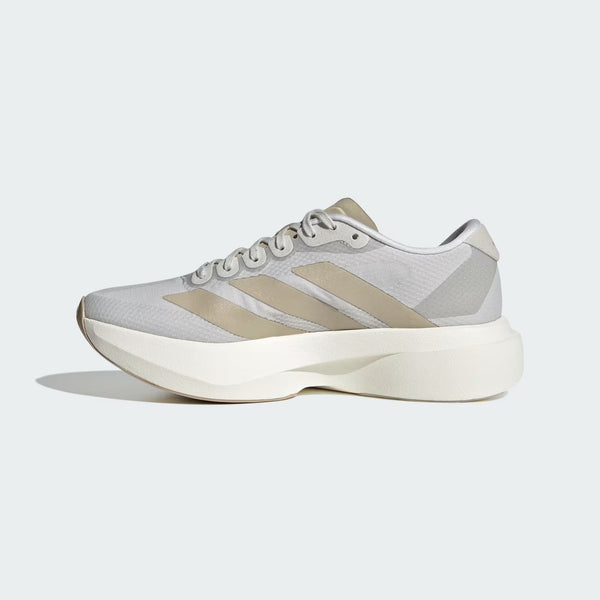 An Adidas running shoe in light gray and beige, featuring a chunky off-white sole, shown from a side profile on a light gray background.