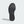 An all black outsole of am adidas running shoes.