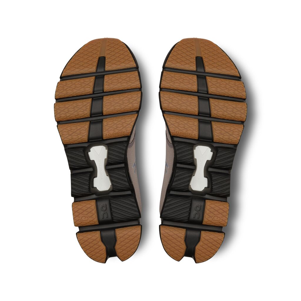 The outsole of these Men's On Gym shoes is a mix of brown and black colors